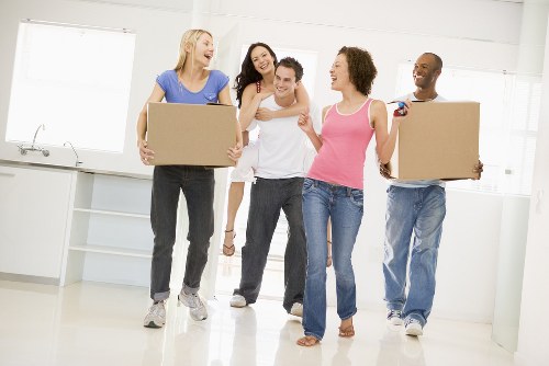 Professional movers handling boxes in Twickenham