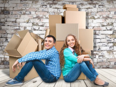 Professional movers handling residential items