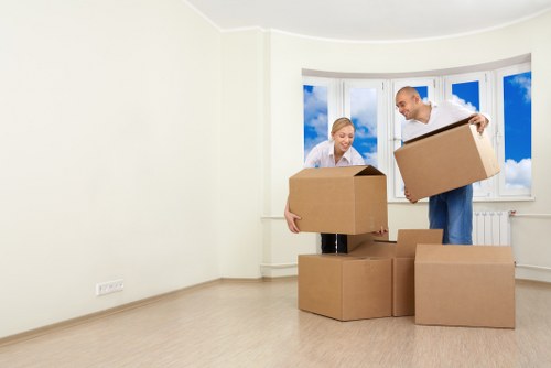 Professional movers assisting with a household move in Leaves Green