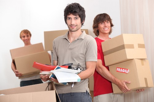 Well-organized moving process in Custom House with labeled boxes