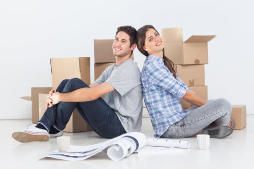 Professional movers handling household items in Pratts Bottom