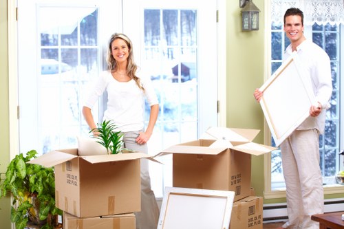 Efficient movers handling furniture in Aldwych