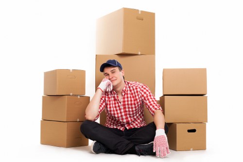 Movers carefully packing furniture for transport